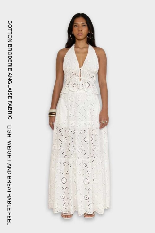 White cotton broderie anglaise maxi skirt with pockets and flowy silhouette