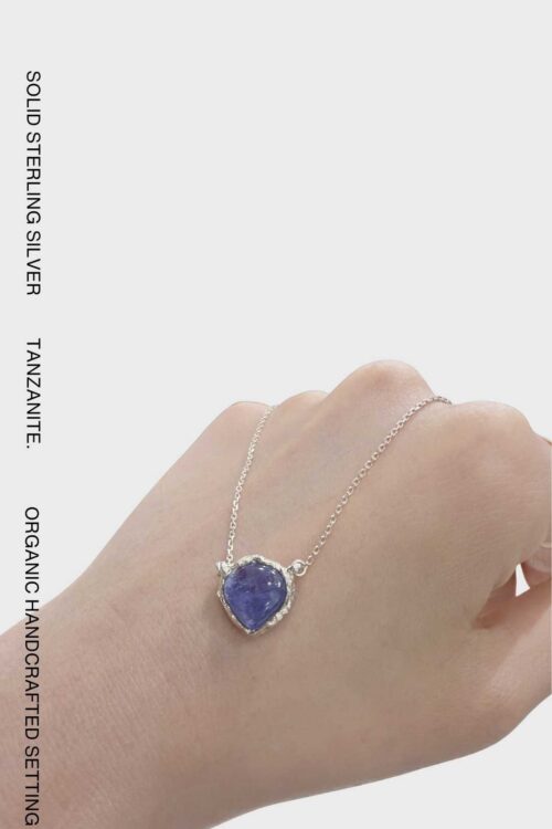 One-of-a-kind 925 sterling silver pendant necklace featuring a natural tanzanite gemstone in an organic handcrafted setting.