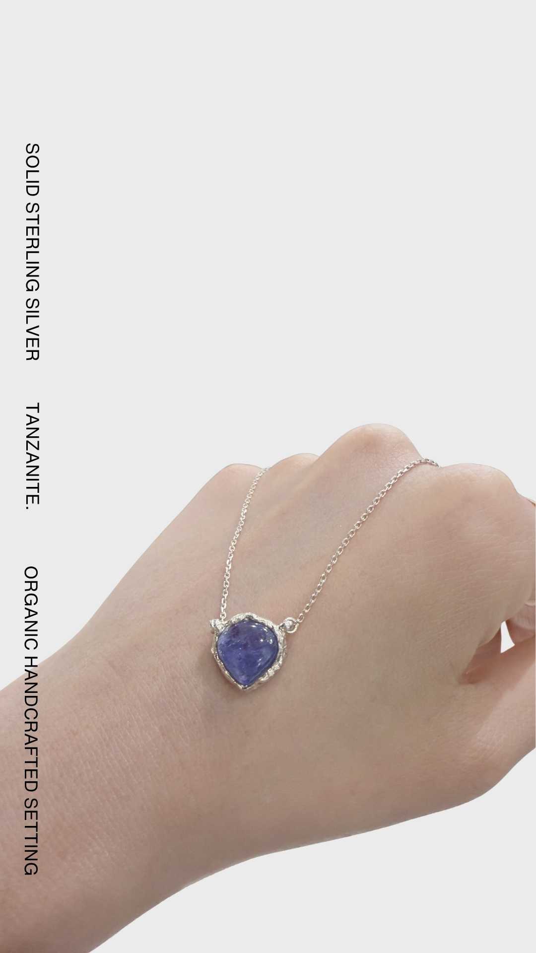 One-of-a-kind 925 sterling silver pendant necklace featuring a natural tanzanite gemstone in an organic handcrafted setting.