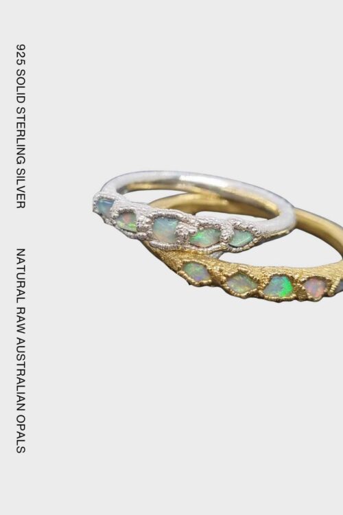 Handcrafted sterling silver ring featuring five natural raw Australian opals set in an organic textured recycled silver band by Jo Cooper.