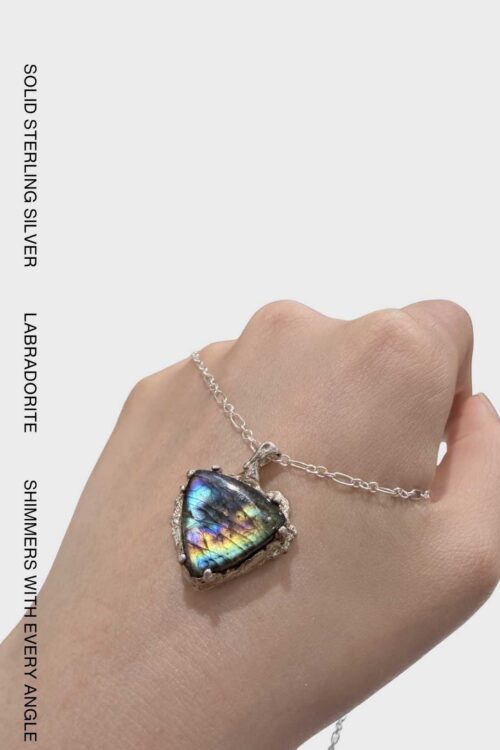 One-of-a-kind oval labradorite pendant necklace handcrafted in 925 sterling silver with an organic textured setting.