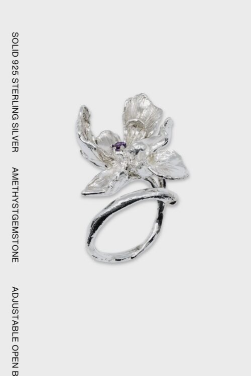 Iris flower sterling silver adjustable open ring with textured petals and a purple amethyst gemstone at the centre.