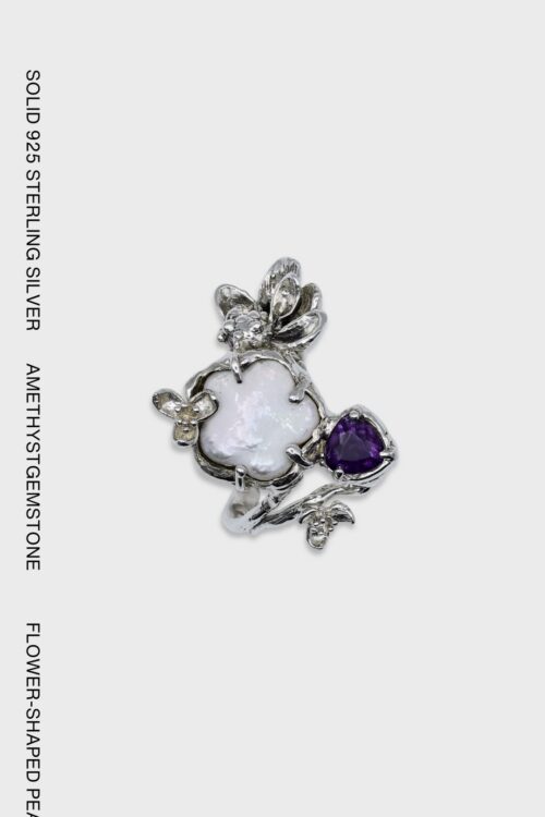 Floral pearl and amethyst garden ring with sculptural sterling silver flowers, leaves and organic botanical details.