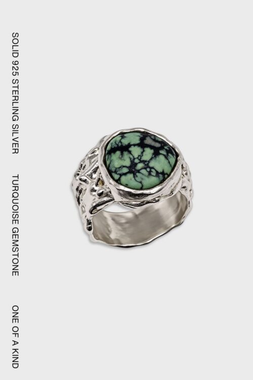 One-of-a-kind turquoise sterling silver ring with organic sculptural setting.